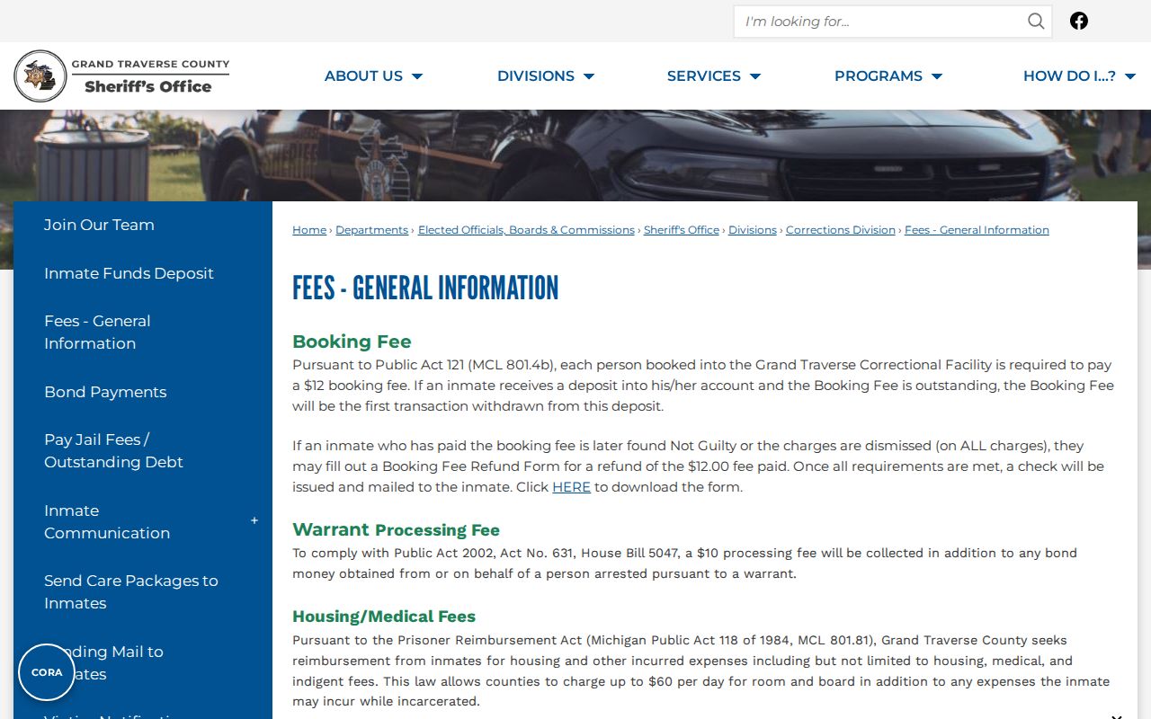 Grand Traverse County warrant processing fee notice and booking fee blocks